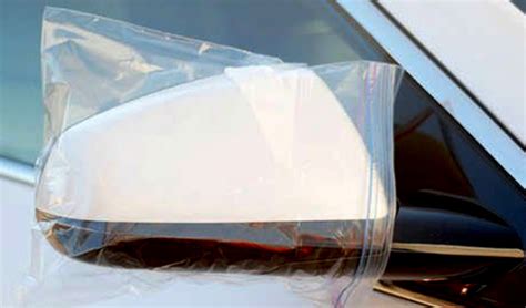 ziplock bag on car mirror.